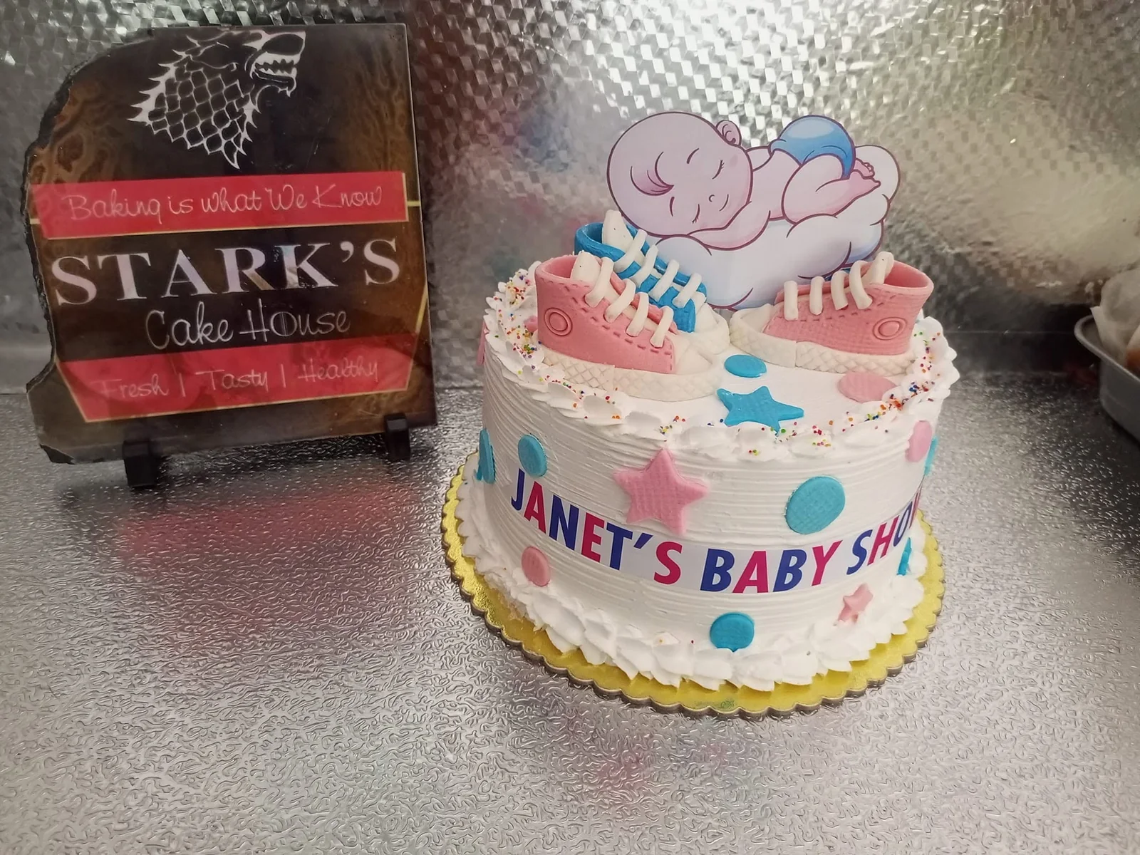 Baby shower celebration cake by Stark’s Cake House in Turkana