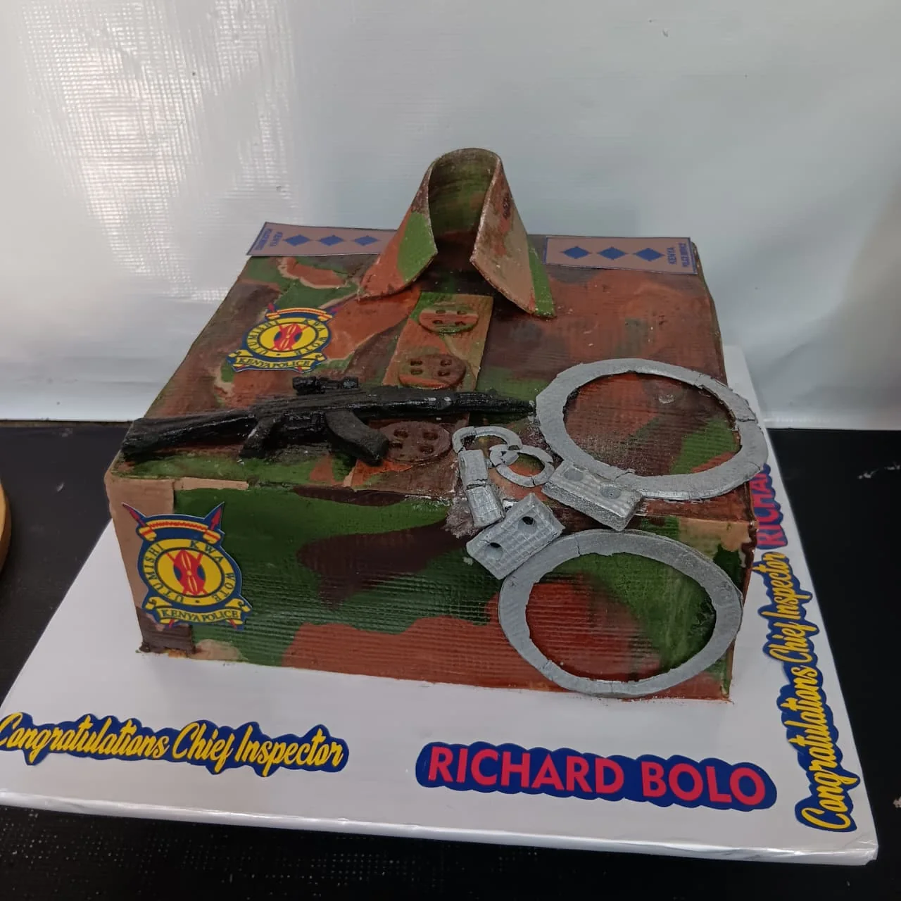 Custom uniform themed celebration cake by Stark’s Cake House in Turkana