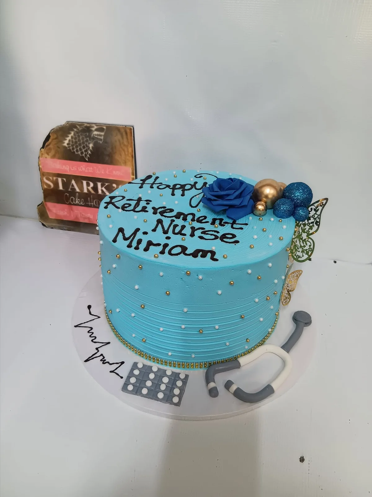 Pink nurse retirement cake by Stark’s Cake House in Turkana
