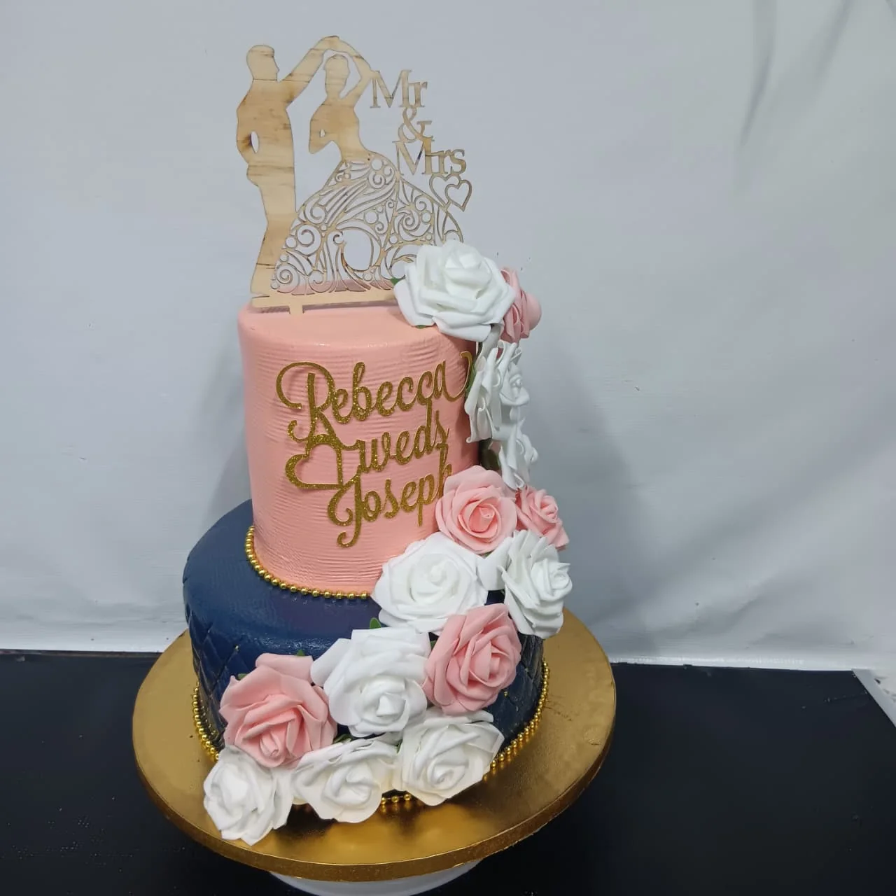 Pink and blue wedding cake by Stark’s Cake House in Turkana